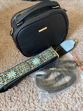 Compact Black Crossbody Bag with Gold Accent